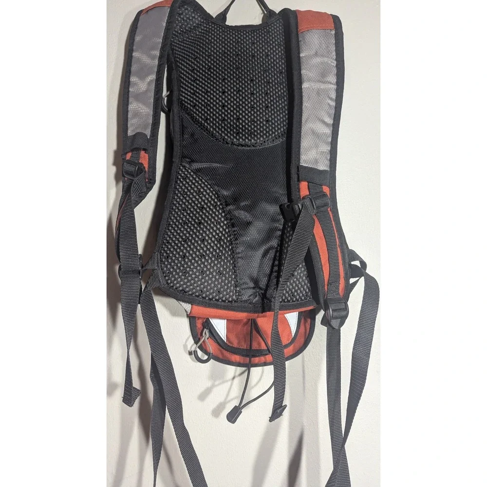 Coleman Revel 8L Hydration Backpack 2L Red Black Hiking Outdoors Pack no bladder